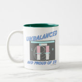 Onevenwichtig en trots. tweekleurige koffiemok (Links)