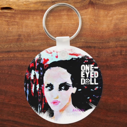 ongeschilde pop met logo sleutelhanger (Voorkant)