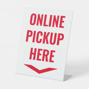 Online afhaling hier wit reclamebord met voetstuk
