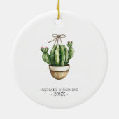Ons eerste kerstcadeau samen met een cactus keramisch ornament (Achterkant)