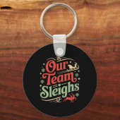 Ons team sleept Kerstmis rendieren van de Kerstman Sleutelhanger (Voorkant)