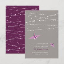 Ontvangst van Paarse papieren kranen met lichte ri