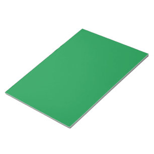Ontwerp met een groene achtergrond en witte rand notitieblok