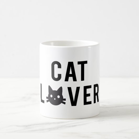 Ontwerp van de het omvergooientekst met zwart katt koffiemok (Center)