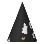 Onze kleine boe draait om twee feesthoedjes (Links)