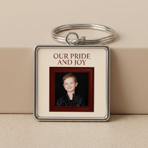 Onze trots en vreugde gepersonaliseerde kinderfoto sleutelhanger