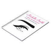 Oog met de uitbreiding van de eyelinerzweep het notitieboek (Linkerzijde)