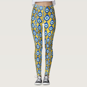 Oogpatroon van het aambeeld op gouden textuur leggings