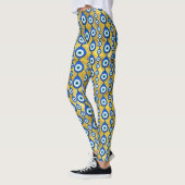 Oogpatroon van het aambeeld op gouden textuur leggings (Links)