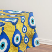 Oogpatroon van het aambeeld op gouden textuur tafelkleed (Voorbeeld)