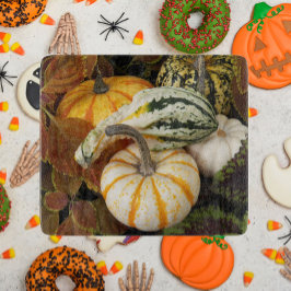 Oogst Pompoenen en Squash Stilleven Foto Snijplank