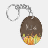 Oogstpompoenen, bladeren en olie sleutelhanger (Voorkant Links)