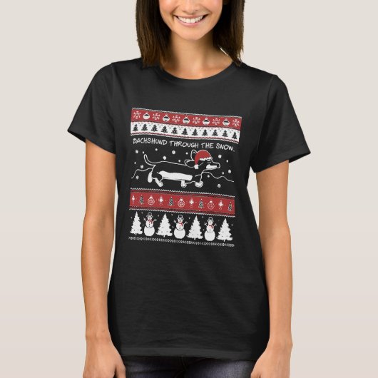 Oogstrelend kerstdachshund door de sneeuw t-shirt (Voorkant)