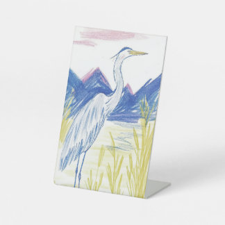 Ooievaars uit een luchtspiegeling reclamebord met voetstuk