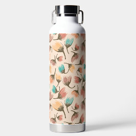 Op de door de wind getossde bloemenkiezels-verre d waterfles