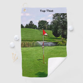 Op de groene aangepaste tekst golfhanddoek (Insitu)