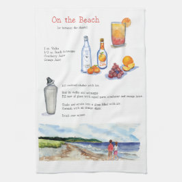 Op de handdoek van de strand