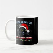 Op de Naughty List en ik betreur het dat er niets  Koffiemok (Links)