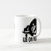OP DE VLOER LIGGEN KOFFIEMOK (Voorkant rechts)