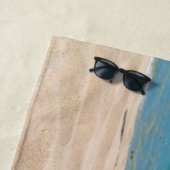 Op de zand-handdoek strandlaken (In situ)