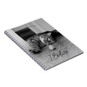 Op de zijkant van de muis met een tabblad met een  notitieboek (Rechterzijde)