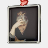 Op een boek metalen ornament (Links)