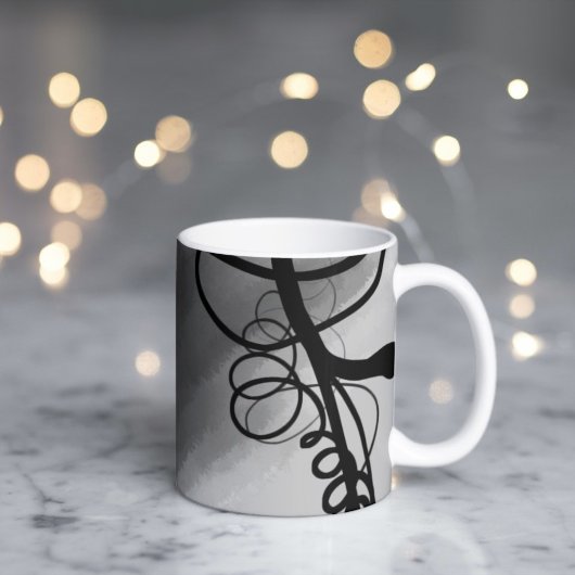 Op het raster: abstract grijs, zwart en wit koffiemok