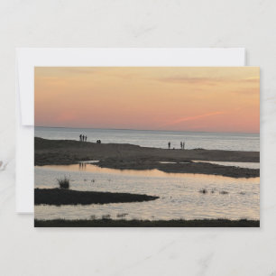 Op het strand bij zonsondergang