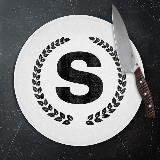 Op maat gemaakt monogram met laurierbladeren snijplank