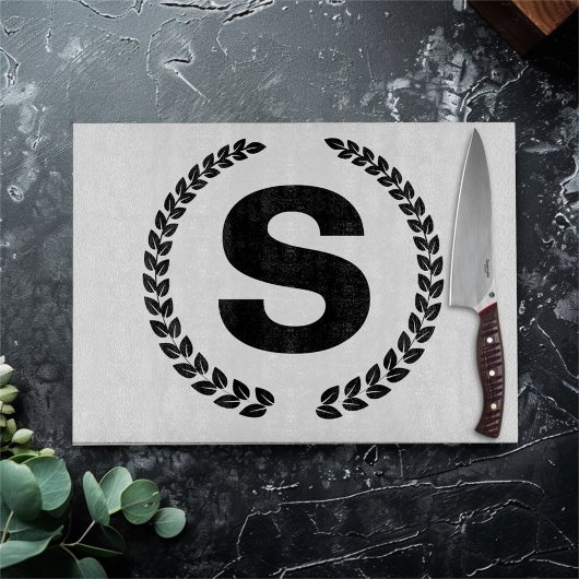 Op maat gemaakt monogram met laurierbladeren snijplank