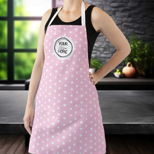 Op maat gemaakte roze polkadot kookschort met logo schort