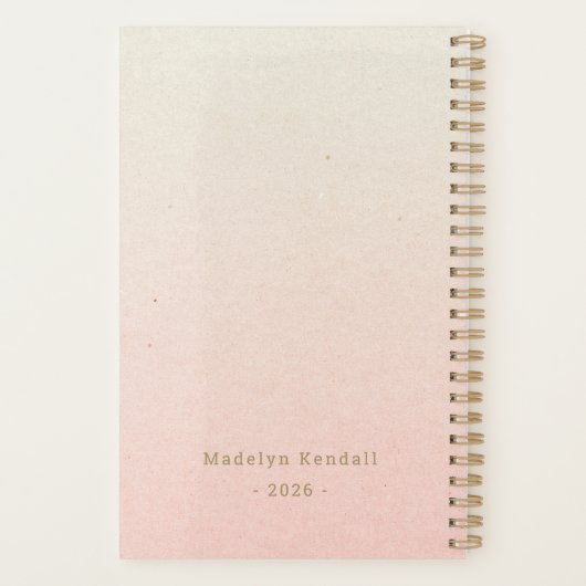 Op maat gemaakte typografie met roze en goud in ve planner (Achterkant)