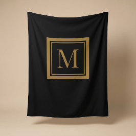 Op maat gemaakte zwarte en gouden lijst monogram fleece deken
