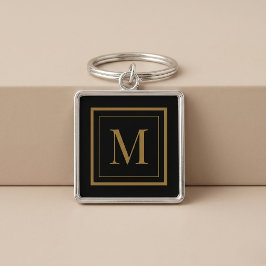 Op maat gemaakte zwarte en gouden lijst monogram sleutelhanger
