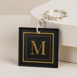 Op maat gemaakte zwarte en gouden lijst monogram sleutelhanger