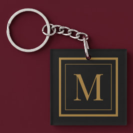 Op maat gemaakte zwarte en gouden lijst monogram sleutelhanger