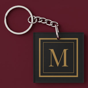 Op maat gemaakte zwarte en gouden lijst monogram sleutelhanger