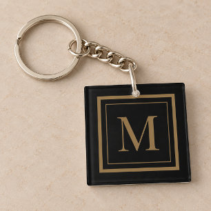 Op maat gemaakte zwarte en gouden lijst monogram sleutelhanger