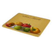 Op natuurlijke wijze gepersonaliseerde groenten en snijplank (Hoek)