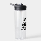 Op onze schuldenvrije reis waterfles (Rechts)