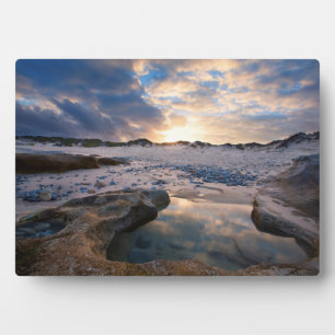 Op zonsondergang in een puddle fotoplaat