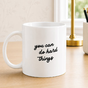 Opbeurende typografie quote 'Je kan moeilijke ding Koffiemok