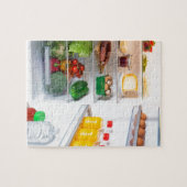 Open koelkast gevuld met voedsel legpuzzel (Horizontaal)