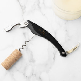 Opener voor wijn met gegraveerde gouden monogram E