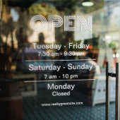 Openingstijden witte winkel transparante achtergro raamsticker