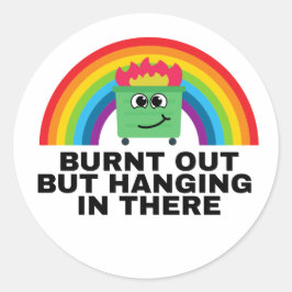 Opgebrand maar het nog volhoudend stickerblad ronde sticker
