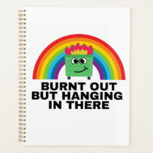 Opgebrand maar nog net aan het doorhangen Planner