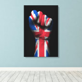 Opgeheven gebalde vuist met Union Jack Flag Canvas Afdruk (Insitu (Houten vloer))