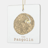 Opgerolde afbeelding van pangoline keramisch ornament (Links)