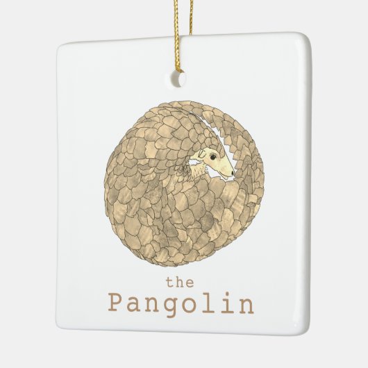 Opgerolde afbeelding van pangoline keramisch ornament (Links)